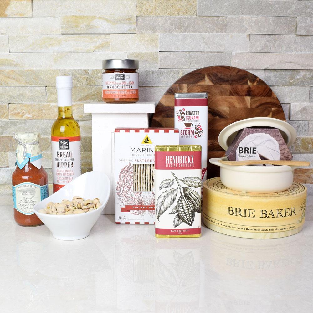 Indulge someone with the Coffee & Brie Baker Gift Set. It has brie cheese,  a brie baker, coffee, a dark chocolate bar, pistachios, bruschetta, garlic  & tomato bread dipper, cocktail sauce, crackers