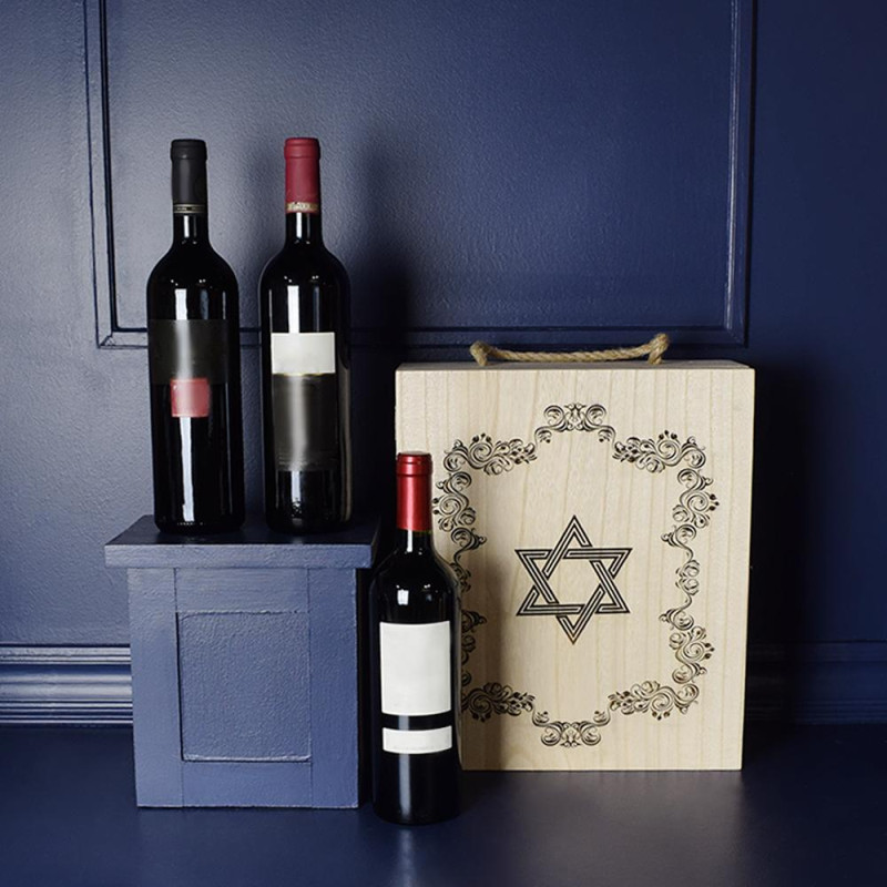 The Kosher Wine Trio Git Basket includes three bottles of wine in a